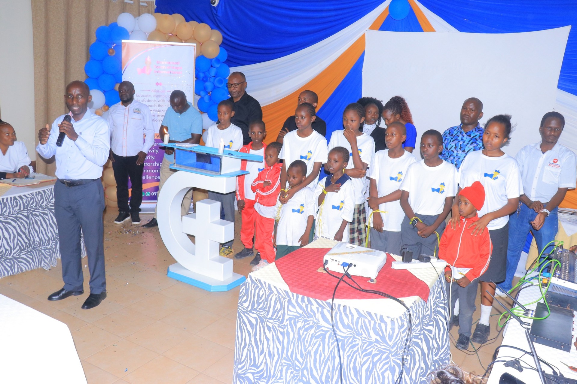 Community gathering at a Torch of Hope program event